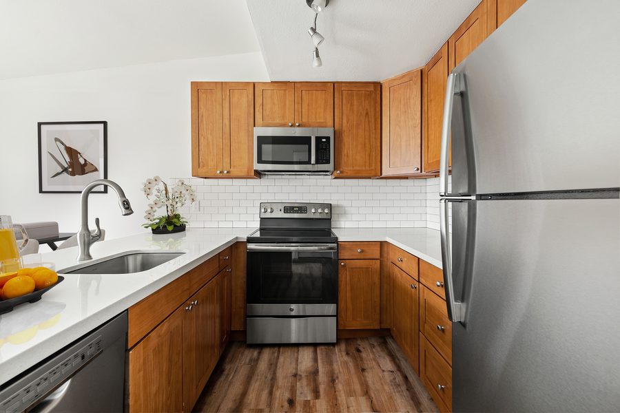 Renovated kitchen with quartz counters